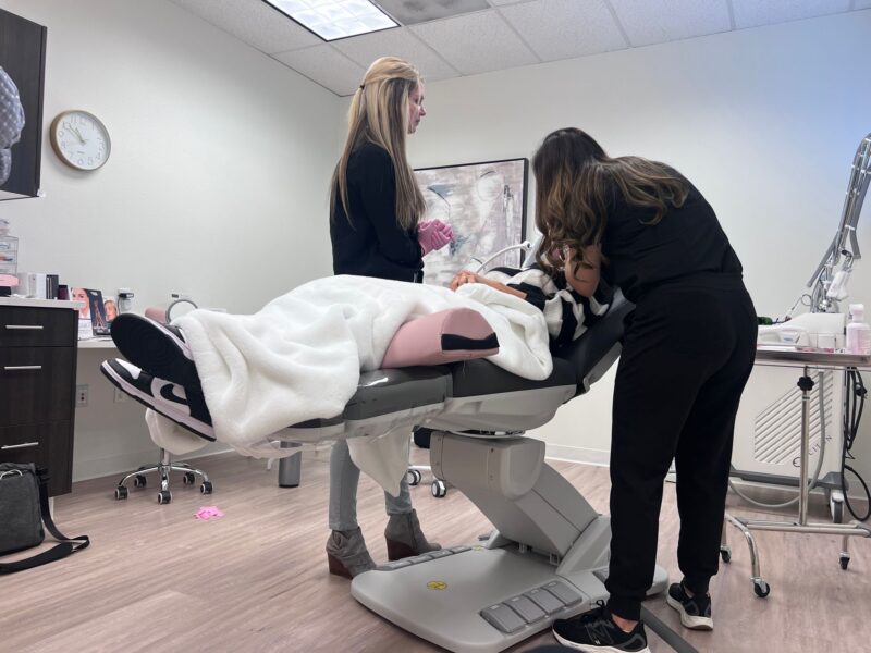 Laser Hair removal tacoma, wa, featuring Shanti and Heather working on a patient